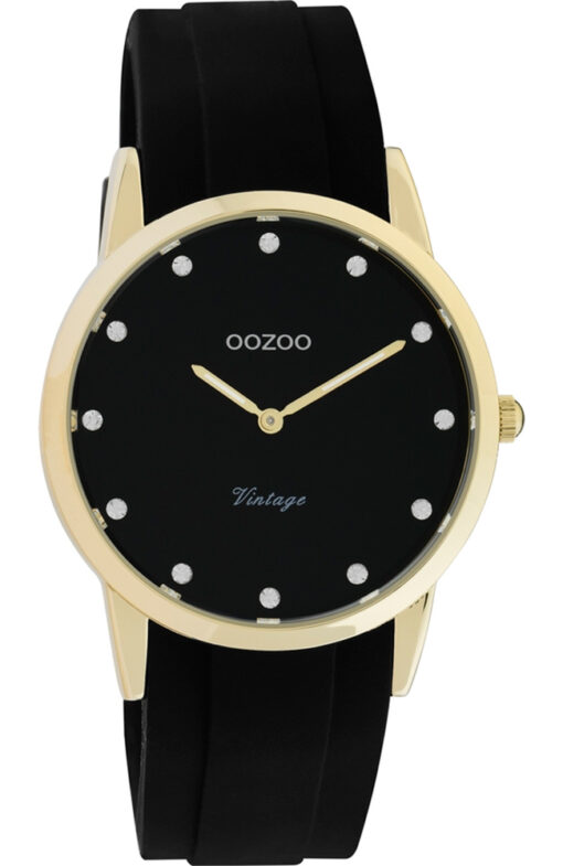 Γυναικείο ρολόι ΟΟΖΟΟ με μαύρο χρώμα καντράν και με μαύρο χρώμα λουράκι. Η διάμετρος της κάσας είναι 38mm και είναι κατασκευασμένη από μέταλλο.