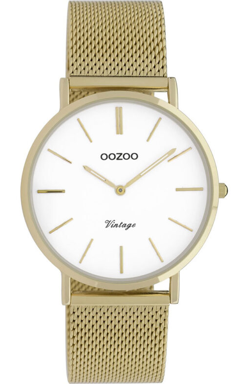 Γυναικείο ρολόι ΟΟΖΟΟ με λευκό χρώμα καντράν και με χρυσό λουράκι. Η διάμετρος της κάσας είναι 36mm και είναι κατασκευασμένη από μέταλλο.